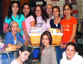 Girl Scout Troop 1249 made 2 baskets of Books on Tape for the children of Angela's House